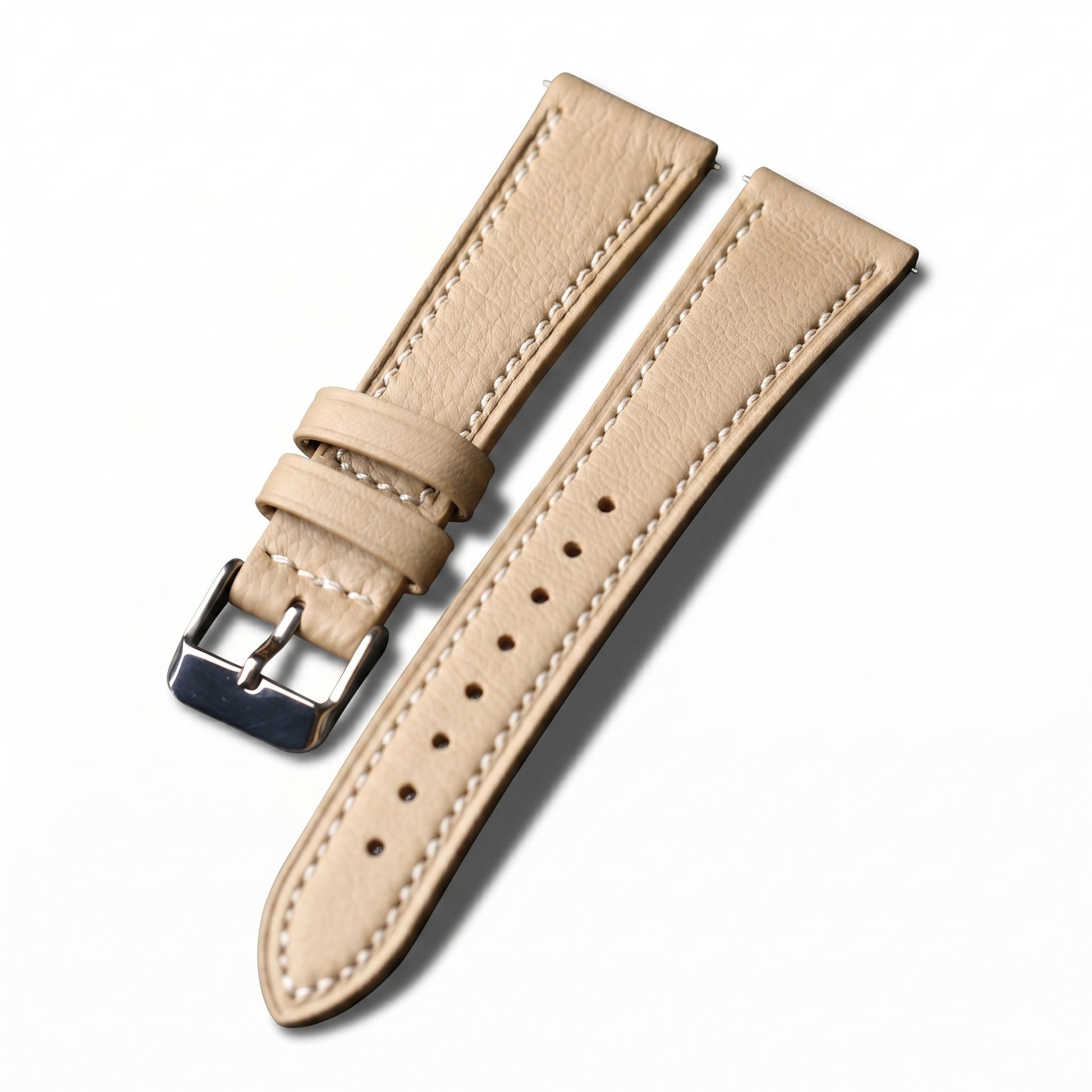 Beige leather watch strap on a white background