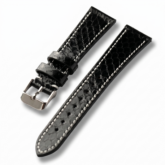 Python Snake Skin Black textured watch strap with silver buckle on a white background