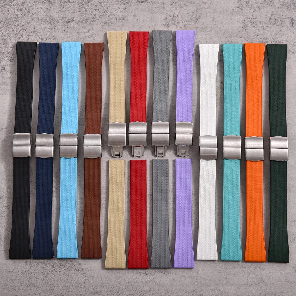 Set of colorful watch straps arranged in a grid on a gray background