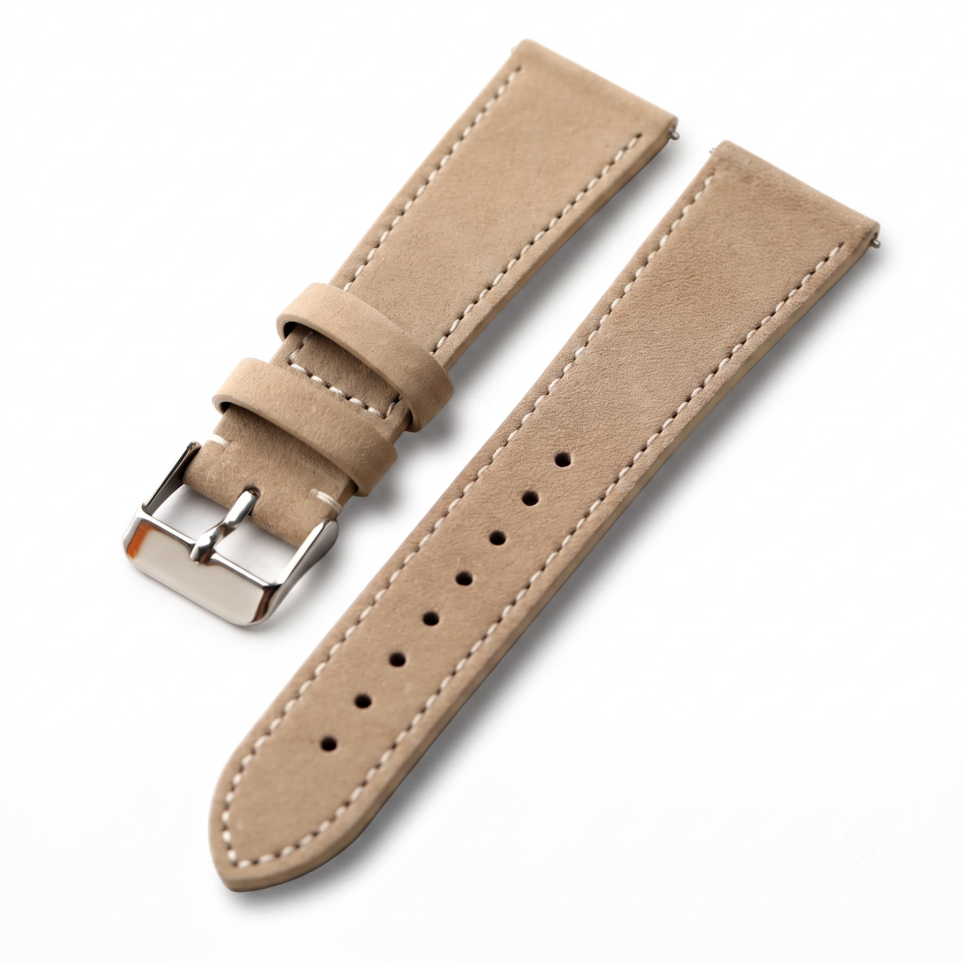 A light tan suede watch strap with matching stitching and a silver-tone buckle, displayed on a clean white background.